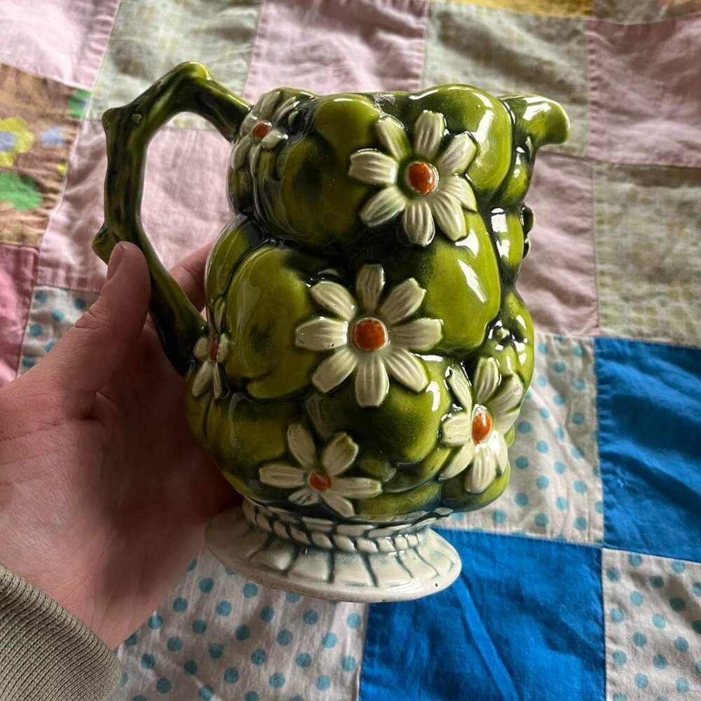 Green ceramic pitcher